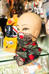 Biosecurity implements, covered mouths, in the city