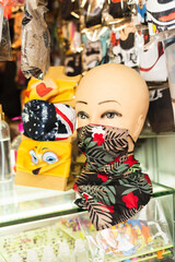 Biosecurity implements, covered mouths, in the city