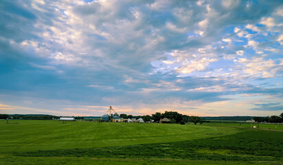 Gentle sunset over a Kansas farm © Calvin J. Copeland