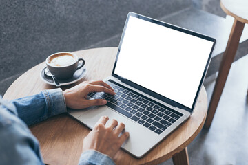 computer mockup image blank screen.hand woman work using laptop with white background for advertising,contact business search information on desk at coffee shop.marketing and creative design