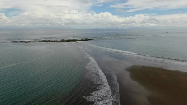 Beautiful cinematic aerial footage of the Whale Tale beach in the Marino Ballena National Park in Costa Rica 