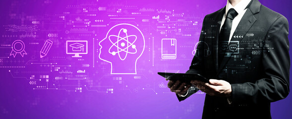 Online education concept with businessman using his tablet computer