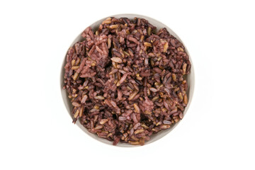 Cooked steamed organic brown rice(raspberry rice) in white bowl top view isolated on white background
