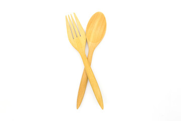 Wooden spoon and fork isolated on white background