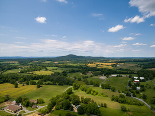 Fototapeta na wymiar Aerial view of Barnesville, Montgomery County, Maryland. Barnesville was chartered in 1811. Sugarloaf Mountain is on the horizon.