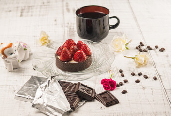 Strawberry dessert with coffee and chocolate morning Breakfast with flowers