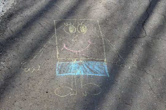Mirny, Yakutia / Russia - 05.23.2020: Children's drawing with chalk on the pavement.