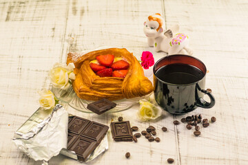 Strawberry dessert with coffee and chocolate morning Breakfast with flowers