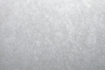 close up image of foam with some parts in focus