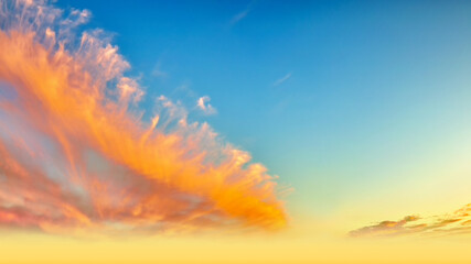 mellow sky landscape background at sunset natural color of evening pink cloudscape panorama with sun below horizon ultra wide panoramic view