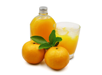100% fresh orange juice in flat glass bottle and in glass with ice and orange fruit with leaves isolated on white background 