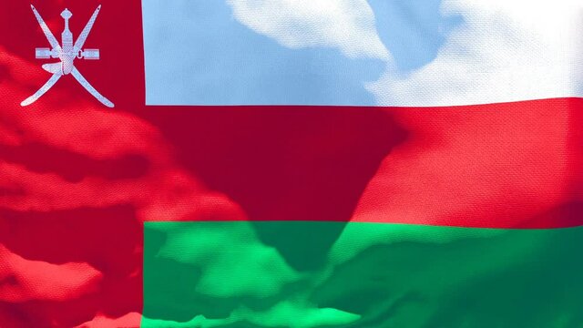 The national flag of Oman flutters in the wind