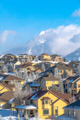 Scenic town with unobstructed view of towering snowy peaks of Wasatch Mountain