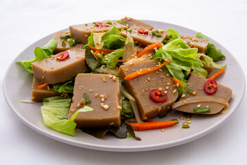 Seasoned Acorn Jelly Salad which is called Muk made of buckwheat