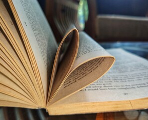 open book on wooden table