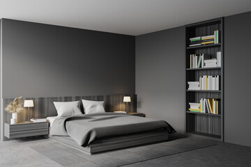 Grey master bedroom corner with bookcase