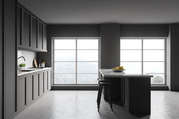 Dark grey kitchen with bar, side view