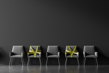 Grey chairs in barrier tape, social distancing