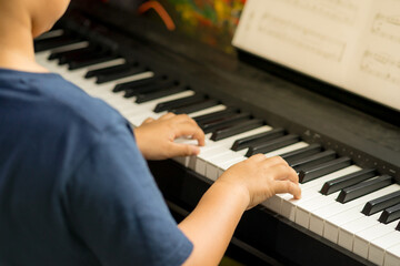 The Boys playing piano, Learning Piano