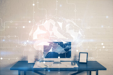 Multi exposure of work space with computer and human brain hologram. Brainstorm concept.
