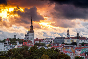 Naklejka premium Skyline of Tallinn Old Town, Estonia during sunset in a cloudy day 