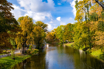 Fototapeta na wymiar The City Canal in Riga at Bastejkalna Park in Autumn