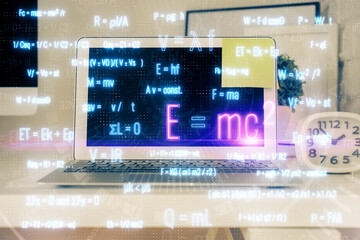 Desktop computer background and formula hologram writing. Double exposure. Education concept.