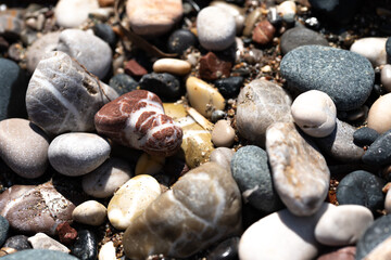 Colour different stones and pebbles on the seaside