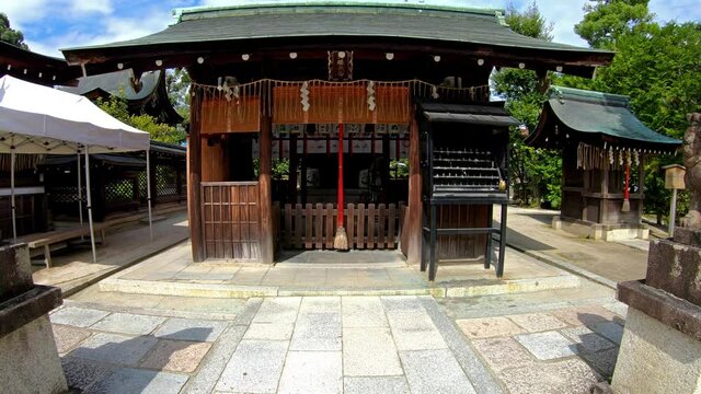 The bell and offering box at the  entrance to  Massha Hachiman Shrine on the territory of Shikichi-jinja Shrine. Kyoto. Japan
