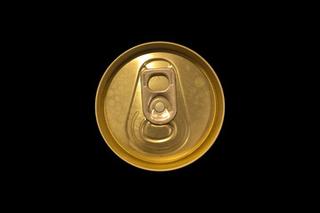 aluminum beer can lid,gold color isolated on a black background.