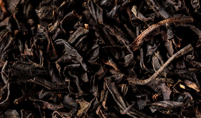 Close up of granules of black tea as a background.
