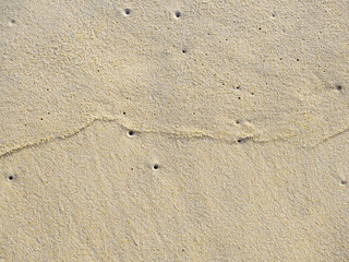close up sand ground floor at the sea beach , background and textured