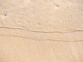 close up sand ground floor at the sea beach , background and textured