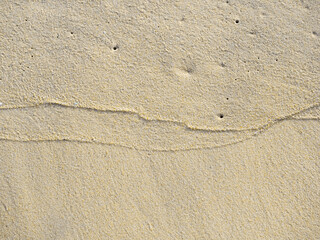 close up sand ground floor at the sea beach , background and textured