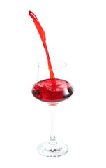 pouring red wine in glass isoalted on white background
