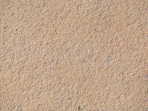 close up sand ground floor at the sea beach , background and textured