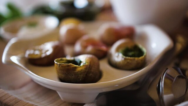 Dish of snails on a plate