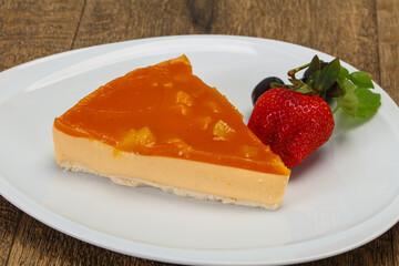 Cheesecake with apricot served strawberry