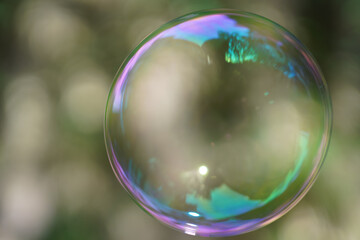 soap bubbles flying on a blurry background
