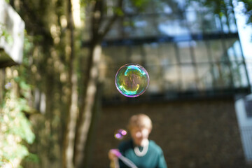 soap bubbles flying on a blurry background