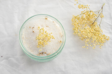 sweet home made lemon elderflower sugar in a glas