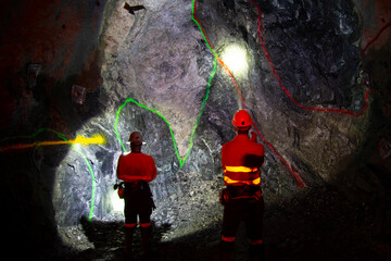 Underground Miners in Ore Tunnel