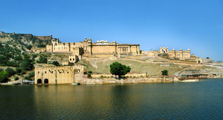 Jaipur,Rajasthan,India - January,2012. Located high on a hill. the fort overlooks Maotha Lake. Beautiful morning view of famous Amer fort of Jaipur. The beautiful architecture of fort.