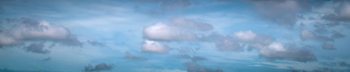 Naklejka na ściany i meble blurred peaceful natural blue sky clouds landscape background