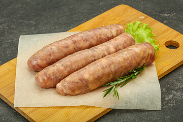 Raw pork meat sausages for grill