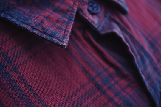 Close up of red and blue flannel fabric shirt.