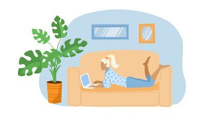 Blonde girl in pajamas is lying on  sofa with a laptop. A young self employed freelancer woman works at home or browses  pages of social networks. Stock vector illustration isolated on white.