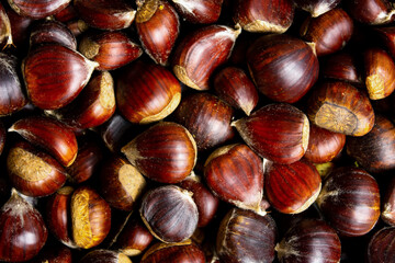 Chestnuts on a pile making background