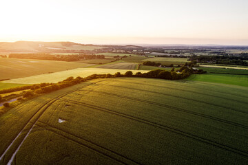 Fototapeta na wymiar Beautiful drone landscape image over lush green Summer English countryside during late afternoon light