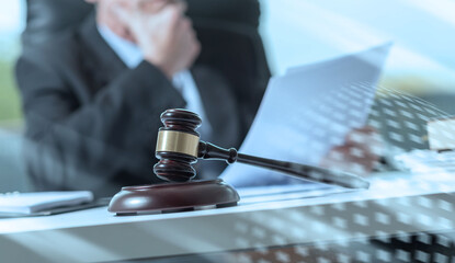 Lawyer reading legal document; light effect